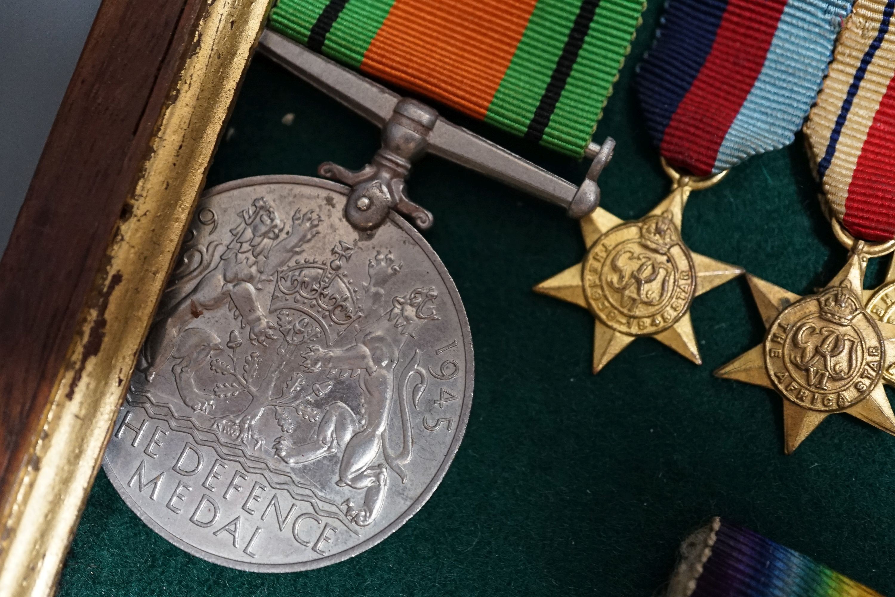 A George VI Efficiency medal to 885238 SJT. R. .BURRIDGE .R.A. various unnamed WW2 medals and miniatures